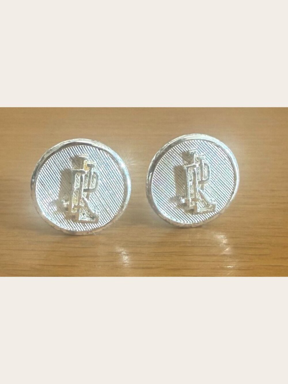 Ralph Lauren RLL Monogram Round Clip-On Earrings Silver Tone